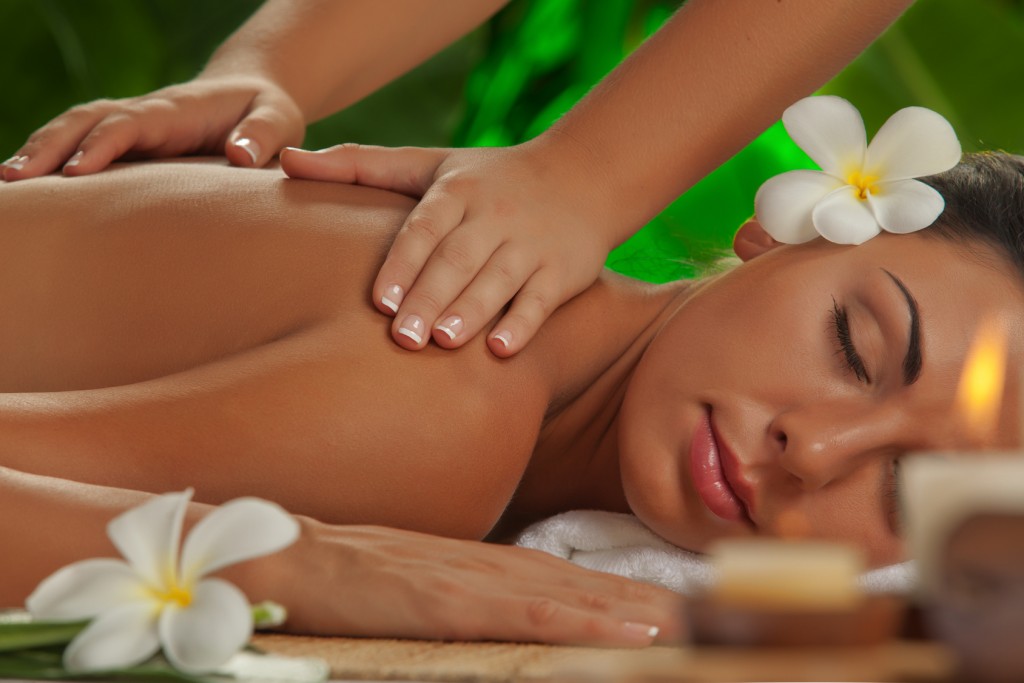 portrait of young beautiful woman in spa environment.